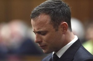 Olympic and Paralympic track star Oscar Pistorius reacts during judgement at the North Gauteng High Court in Pretoria, September 11, 2014.   REUTERS/Phill Magakoe/Pool
