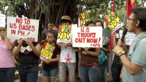 Militant groups led by the League of Filipino Students staged a rally in front of the US Embassy in Manila on Tuesday, Oct. 14, 2014 denouncing the killing of a Filipino transgender in Olongapo City allegedly by a member of the US Marines.  (Eagle News Service)