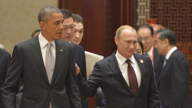 (L-R, front) U.S. President Barack Obama, Russian President Vladimir Putin and Chinese President Xi Jinping attend a plenary session during the Asia Pacific Economic Cooperation (APEC) Summit in Beijing, November 11, 2014. REUTERS/Alexei Druzhinin/RIA Novosti/Kremlin (CHINA - Tags: POLITICS) ATTENTION EDITORS - THIS IMAGE HAS BEEN SUPPLIED BY A THIRD PARTY. IT IS DISTRIBUTED, EXACTLY AS RECEIVED BY REUTERS, AS A SERVICE TO CLIENTS