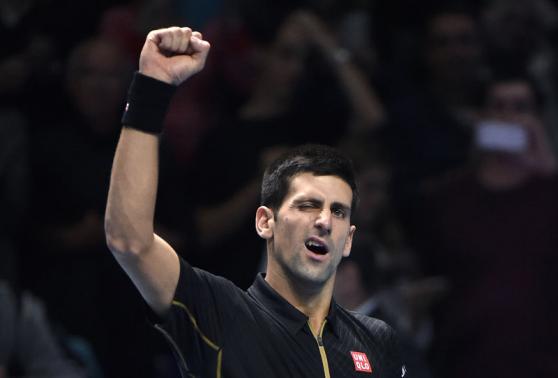 Novak Djokovic of Serbia reacts after winning his semi-final tennis match against Kei Nishikori of Japan at the ATP World Tour Finals at the O2 Arena in London November 15, 2014. CREDIT: REUTERS/TOBY MELVILLE