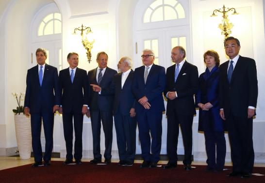 U.S. Secretary of State Kerry, Britain's Foreign Secretary Hammond, Russian Foreign Minister Lavrov, Iranian FM Zarif and German FM Steinmeier, French FM Fabius, EU envoy Ashton and Chinese FM Wang pose for photographers before a meeting in Vienna