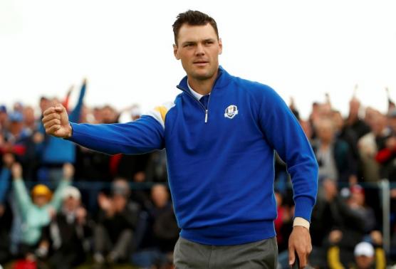 European Ryder Cup player Martin Kaymer celebrates his putt to halve the first hole during the 40th Ryder Cup singles matches at Gleneagles in Scotland September 28, 2014. CREDIT: REUTERS/PHIL NOBLE