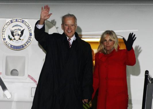 U.S. Vice President Joe Biden (L) and his wife Jill wave upon their arrival at Boryspil International airport outside Kiev November 20, 2014.  REUTERS/Valentyn Ogirenko
