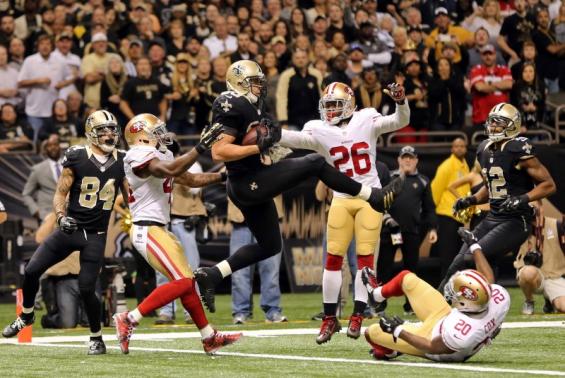 Nov 9, 2014; New Orleans, LA, USA; New Orleans Saints tight end Jimmy Graham (80) catches an apparent touchdown catch, but was flagged for offensive pass interference on the last play of regulation against the San Francisco 49ers at Mercedes-Benz Superdome. The 49ers won 27-24. Mandatory Credit: Chuck Cook-USA TODAY Sports