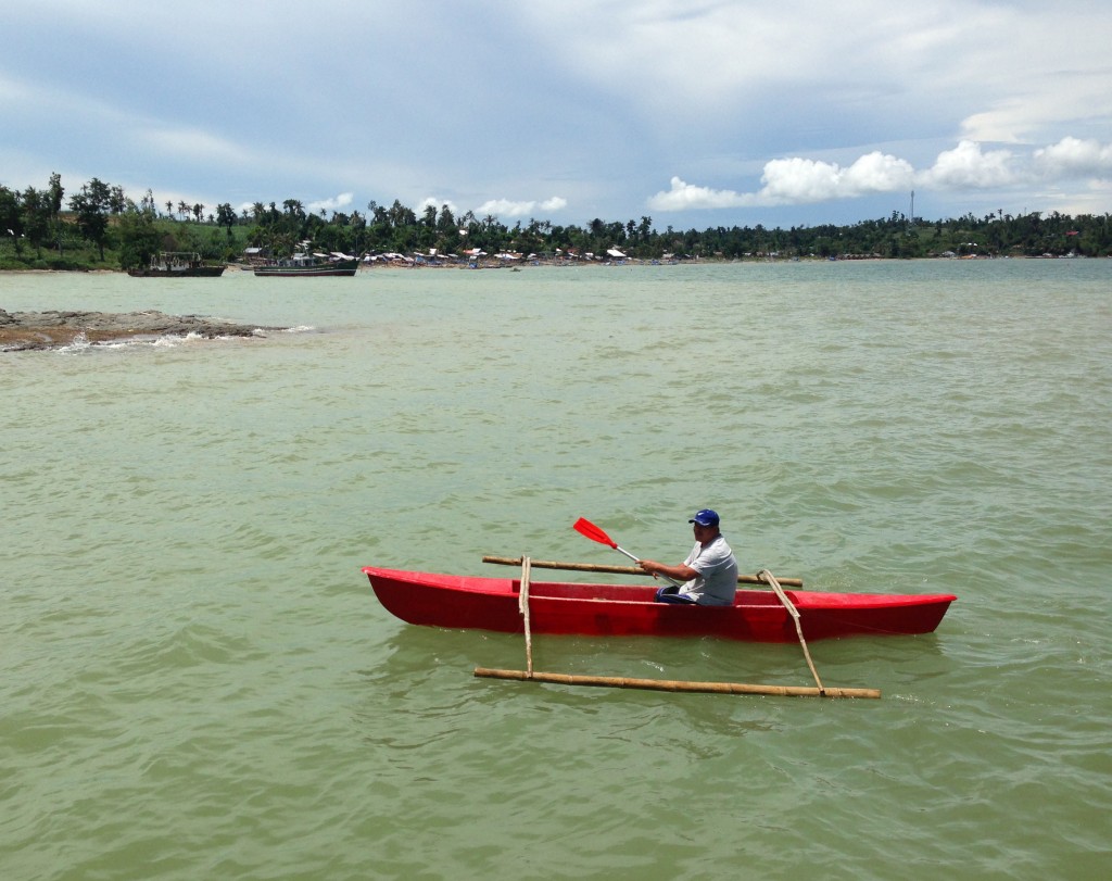 Since February 2014, WWF’s Bancas for the Philippines has helped fisherfolk build 800 fibreglass boats in Northern Palawan, Leyte, Iloilo and Cebu. A beneficiary tests his new ride in Iloilo’s Sicogon Island. (Toni Munar / WWF)