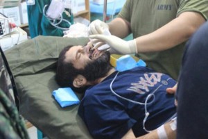Handout photo shows Vinciguerra, a Swiss wildlife photographer who was kidnapped by Islamist rebels more than two years ago, being treated at Camp Bautista Station Hospital in the municipality of Jolo