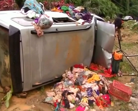 Cars and houses were destroyed in the path of rampaging floods in Malaysia. (Photo grabbed from Reuters video/courtesy Reuters)
