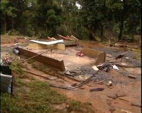 A house destroyed by floods in Malaysia. (Photo grabbed from Reuters video)