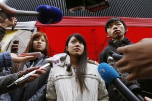Student protesters on hunger strike meet journalists outside the government headquarters in Hong Kong