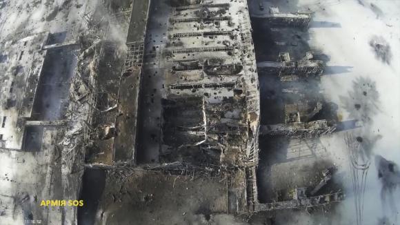  An aerial footage shot by a drone shows the terminal building of the Sergey Prokofiev International Airport damaged by shelling during fighting between pro-Russian separatists and Ukrainian government forces, in Donetsk, eastern Ukraine, seen in this still image taken January 15, 2015 handout video by Army. CREDIT: REUTERS/ARMY.SOS/HANDOUT VIA REUTERS