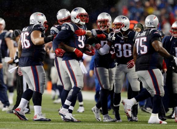 New England Patriots outside linebacker Jamie Collins (91) celebrates after an interception against the Indianapolis Colts in the AFC Championship Game at Gillette Stadium. Mandatory Credit: Greg M. Cooper-USA TODAY Sports