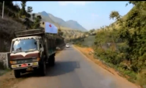 A Red Cross convoy is attacked by unknown assailants in Myanmar.  Two people were wounded in that gunfire attack, prompting Myanmar to declare a state of emergency in the Kokang region. (Photo grabbed from video courtesy Democratic Voice of Burma)