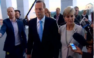 Australia's Prime Minister Tony Abbott and Australian Foreign Minister Julie Bishop talk to reporters regarding Indonesia's planned execution of two Australian nationals.   Australia is seeking an opportunity to discuss a prisoner swap with Indonesia to save the lives of two Australian drug smugglers facing execution.  (Courtesy Reuters/Photo grabbed from Reuters video)