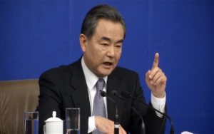 Chinese Foreign Minister Wang Yi defends China's island-building in the South China Sea. (Courtesy Reuters/Photo grabbed from Reuters video)