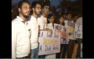 Students in India's financial capital Mumbai hold a candlelight vigil in solidarity with the people of Nepal hit by the worst earthquake in 81 years.