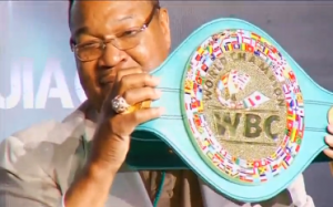 The World Boxing Council (WBC) presented a gold and emerald encrusted title belt in Mexico City on Tuesday (April 21) ahead of the long awaited mega bout between Floyd Mayweather Jr. and Manny Pacquiao, which has been more than five years in the making.  Former heavyweight boxing champ Larry Holmes is shown here holding the belt. (Photo grabbed from Reuters video/Courtesy Reuters)