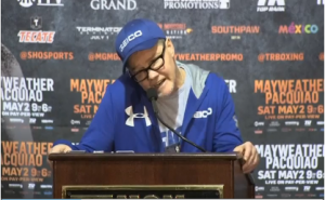 Manny Pacquiao's corner man, Freddie Roach, complained that the Mayweather camp had not yet submitted their gloves for testing before his opposite number, Floyd Mayweather Sr., countered by saying that the Pacquiao camp was simply running scared. (Photo grabbed from Reuters video)