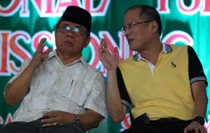 President Benigno S. Aquino III with MILF Central Committee chairman Al Haj Murad Ebrahim graces the ceremonial turnover of crew-served weapons and high powered firearms and the decommissioning of combatants of the Bangsamoro Islamic Armed Forces of the Moro Islamic Liberation Front (BIAF-MILF) at the Old Maguindanao Provincial Capitol in Simuay, Sultan Kudarat, Maguindanao on Tuesday (June 16). The government and the MILF agreed to undertake the ceremonial turnover of the 75 weapons of the BIAF-MILF as provided in the Phase 1 of the Normalization Program for the Bangsamoro. (Photo by Ryan Lim / Malacañang Photo Bureau)