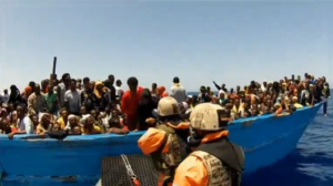 The Germany navy rescues 627 people in the Mediterranean before handing them over to Italian authorities at the port of Reggio Calabria in southern Italy.  (Photo grabbed from Reuters video/Courtesy Reuters)