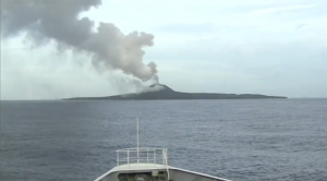 Japanese Coast Guard surveys a new volcanic island 1000 kilometers away from Tokyo. (Courtesy Reuters/Photo grabbed from Reuters video)
