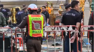 Security forces gather evidence and clean up the site of the Bangkok bomb blast that killed 19 outside renowned shrines in the Thai capital.  (Photo grabbed from Reuters video)