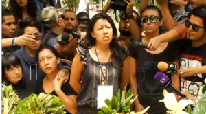 Ruben Espinosa's sister, Patricia, speaking during her brother's funeral.  (Photo grabbed from Reuters video)