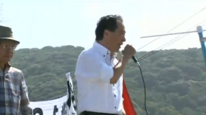 Former Japanese Prime Minister Naoto Kan, who was in power when the meltdowns at the Fukushima Daiichi plant caused a release of radioactive material in 2011, protest the restart of a nuclear plant in Sendai, Japan.  Kan has become the most vocal opponent against nuclear power and Prime Minister Abe.  (Photo grabbed from Reuters video/Courtesy Reuters)