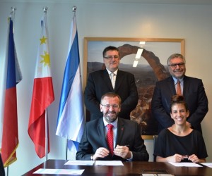Czech Ambassador Jaroslav Olša, Jr. and Israeli Ambassador Effie Ben Matityau with (seated from left) Czech deputy head of mission Jan Vytopil and IsraAID country director Yael Or during the signing of grant.