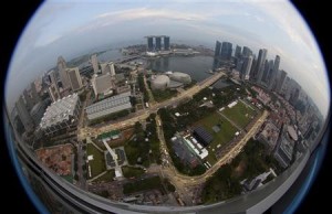 An aerial view of Marina Bay and central business district skyline in Singapore September 19, 2011.  Picture taken with a fisheye lens.   REUTERS/David Loh