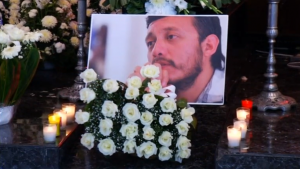 Slain Mexican news photographer, Ruben Espinosa, was laid to rest in Mexico City on Monday (August 03) days after he was shot dead in his apartment.  (Courtesy Reuters/Photo grabbed from Reuters video)