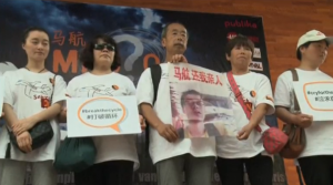 Relatives of Malaysian Airlines flight MH370 passengers grieve over news that their loved ones had died in plane crash. (Courtesy CCTV footage)