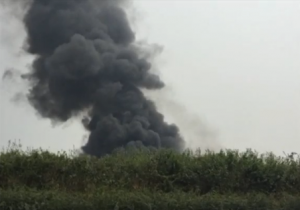 Smoke at blast site in Tianjin, China.  (Courtesy CCTV/Photo grabbed from CCTV video)