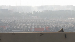 Hundreds of damaged containers at the Tianjin port in China. The explosions at the port, the world's 10th largest, were so big they were seen by satellites in space and registered on earthquake sensors. (Courtesy Reuters/Photo grabbed from Reuters video)