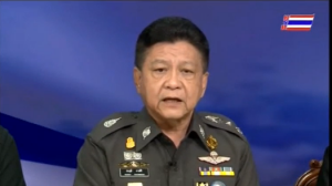 Police spokesman Prawut Thawornsiri says the fingerprints of the second suspect arrested in Thailand's eastern Sakaeo Province match those found at an apartment raided in Bangkok. (Courtesy Thai TV Pool/Photo grabbed from Reuters video) 