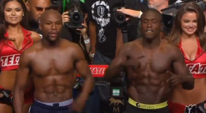 Floyd Mayweather and challenger Andre Berto facing-off on stage. Floyd "Money" Mayweather's last opponent, the unheralded Andrew Berto, said he is not backing down from challenge of Saturday's title fight. (Courtesy Showtime Sports/Photo grabbed from video provided by Reuters)