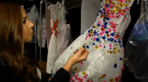 Monique Lhuillier showing one of her collections for the Spring 2016. (Photo grabbed from Reuters video)