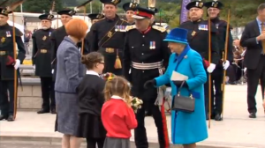 Queen Elizabeth greets children and young well wishers. The Queen became Britain's longest living monarch on Sept. 9, 2015. (Courtesy Reuters/Photo grabbed from Reuters video) 