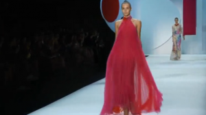 Lipstick pink silk strapless draped bodice with train, coral silk column skirt by Monique Lhuillier. (Courtesy Reuters)