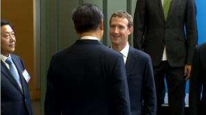 Chinese President Xi Jinping meets Facebook's Mark Zuckerberg during his tour at the main office and headquarters of Microsoft. (Photo grabbed from Reuters video)