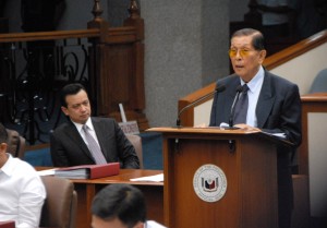 Minority Floor Leader Juan Ponce Enrile inquires about the status of the committee report on the Mamasapano incident during Wednesday’s plenary proceedings. “It is not only for the courage, the valor, and the sacrifices of the fallen and surviving SAF members in that ghastly and brutal carnage to be placed in the annals of this august Chamber, but also to demonstrate to the general public and to let the people know how their Senate dealt with the complex issues that were discovered and brought to light during the Senate investigation,” Enrile said in his privilege speech. (Photo by Joe Arazas / 07 October 2015)