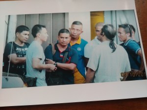 Several men,  mostly former military personnel, tried to enter the Iglesia Ni Cristo's compound at no. 36 Tandang Sora Avenue in Quezon City on Oct. 7, accompanied by one of the defense lawyers, Ahmed Paglinawan. The photo was taken from CCTV security camera footage of the INC. (Eagle News Service)