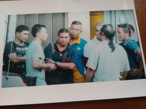 Several men, mostly former military personnel, tried to enter the Iglesia Ni Cristo's compound at no. 36 Tandang Sora Avenue in Quezon City on Oct. 7, accompanied by one of the defense lawyers, Ahmed Paglinawan. The photo was taken from CCTV security camera footage of the INC. (Eagle News Service)