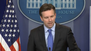 White House says it is aware of reports the U.S. is considering sailing warships close to disputed islands in the South China Sea, but adds that any such move should not provoke a significant reaction from China. (Photo captured from Reuters video)