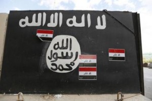 A wall painted with the black flag commonly used by Islamic State militants, near former Iraqi president Saddam Hussein's palace in Tikrit  April 1, 2015. (Reuters/Thaier Al-Sudani)