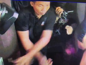 This man who was caught on CCTV camera as having and holding a gun was identified as Jonathan Ledesma, listed as a "deserter" by the Philippine Navy.  (Eagle News Service)