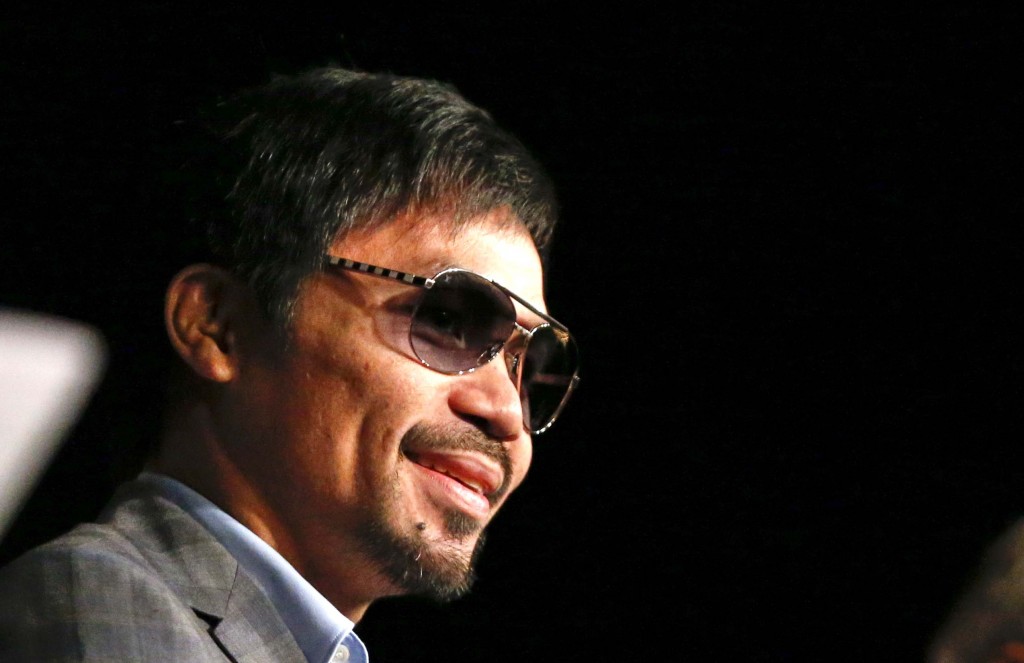 Boxer Manny Pacquiao speaks during a press conference at Madison Square Garden in New York on January 21, 2015, to announce his retirement after the 12-round welterweight championship fight against Timothy Bradley on April 9 in Las Vegas.  / AFP / KENA BETANCUR