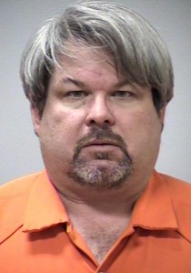(FILES) This file photo released by the Kalamazoo County Sheriff's Office on February 21, 2016, shows Jason Brian Dalton, 45, suspected of killing six people in a shooting spree in the northern US state of Michigan, police said. An Uber driver who may have picked up fares during a weekend killing spree was formally charged with six counts of murder in the US state of Michigan on February 22, 2016.Jason Brian Dalton, 45, sat stony-faced in an orange prison jumpsuit, thick glasses shielding his downcast eyes, as a judge read the charges against him in a Kalamazoo court. Dalton appeared via videoconference from the jail. / AFP / Kalamazoo County Sheriff's Office / HO