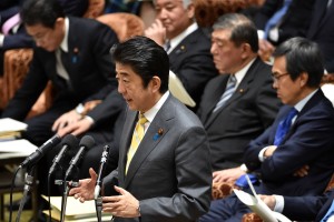 (FILE Photo.  Japanese Prime Minister Shinzo Abe answers questions during a budget committee session of the House of Representatives at the Diet in Tokyo on February 3, 2016. Abe condemned Pyongyang's plan to launch a rocket, calling it "a serious provocation" that would violate UN Security Council resolutions. AFP PHOTO / KAZUHIRO NOGI