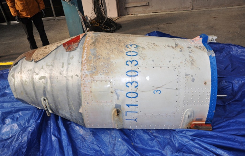 This undated photo released by South Korea's Defense Ministry and received via Yonhap news agency purportedly shows a section of fairing retrieved from the waters off the southern South Korean island of Jeju following a recent rocket launch by North Korea. The rocket North Korea launched this week appeared to be more powerful than one fired in 2012, with an increased range of 12,000 kilometres (7,500 miles) which puts most of the US within reach, a South Korean defence ministry official said on February 9.        REPUBLIC OF KOREA OUT - NO ARCHIVES - RESTRICTED TO SUBSCRIPTION USE -- AFP PHOTO / DEFENSE MINISTRY via YONHAP / AFP / YONHAP / YONHAP
