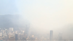 Aerial view of Bogota covered in smoke due to forest fire
